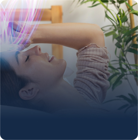 Woman with her hand at her forehead, with a light effect